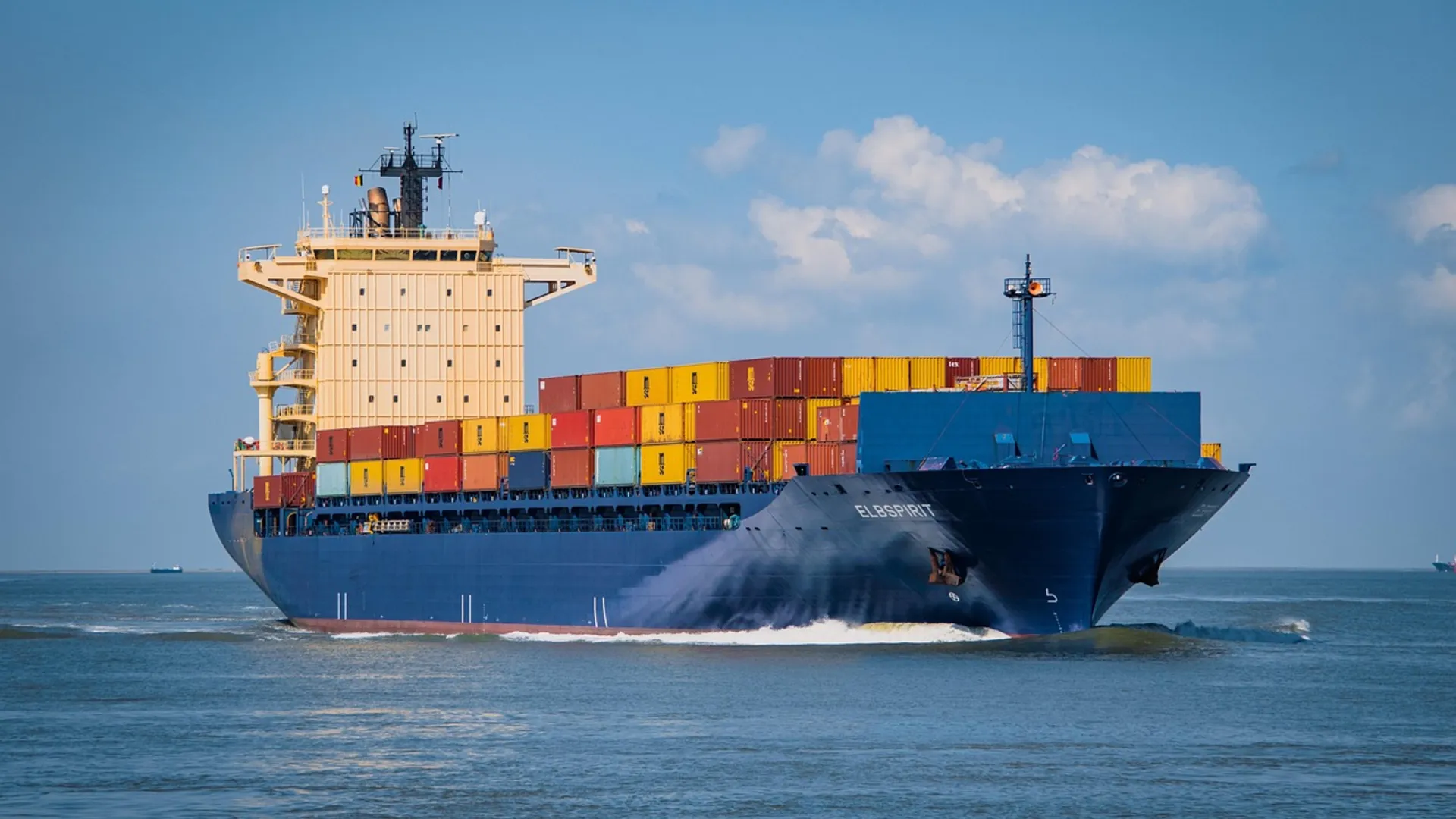 Container ship carrying freight at sea